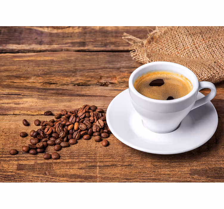 Fotomurale Caffè su un tavolo di legno - TenStickers