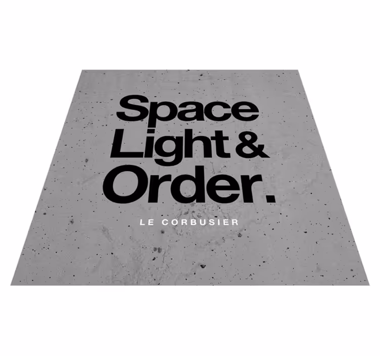 Tappeto vinile frase i bisogni di le corbusier - TenStickers