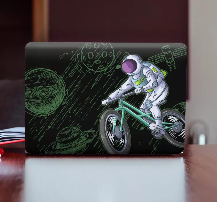 Adesivo per laptop astronauta in bicicletta - TenStickers