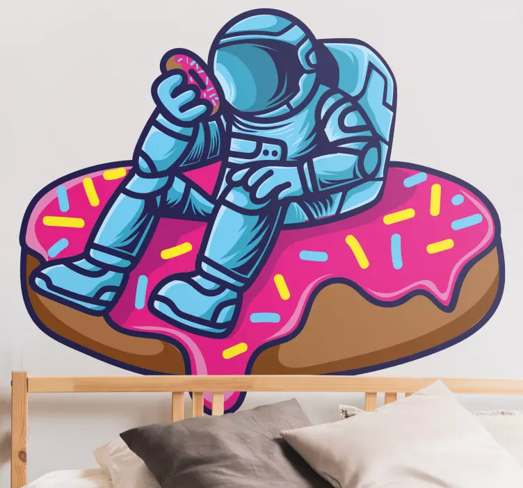 Adesivo spazio astronauta che mangia dolcetti - TenStickers