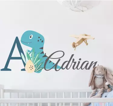 Adesivo cameretta neonato dinosauro blu con nome - TenStickers