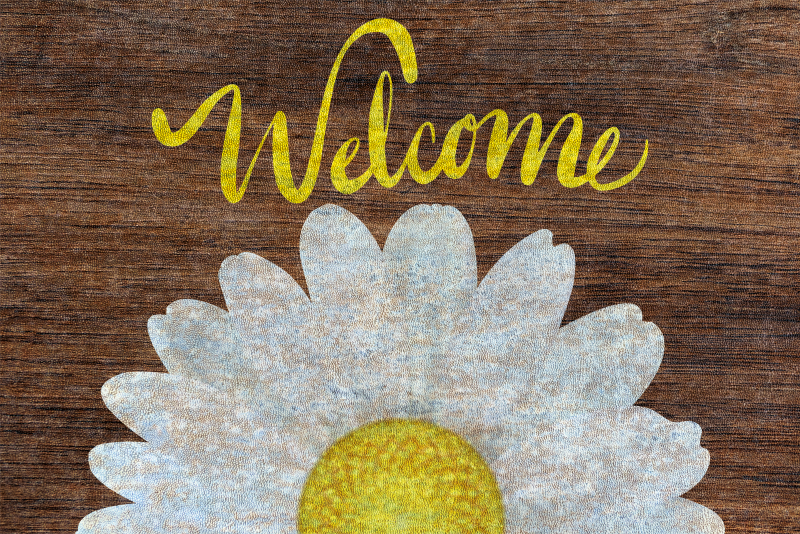 Zerbino pvc messaggio di benvenuto di daisy - TenStickers