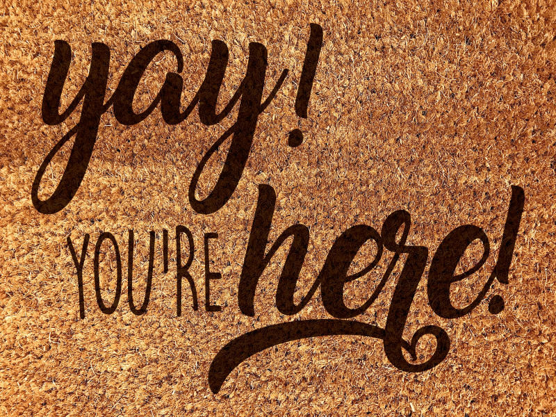 Zerbino pvc frase di benvenuto caloroso - TenStickers